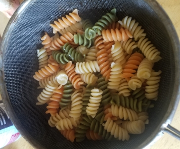 pasta green white orange al dente david m raine cook kitchen strainer dinner pasta rotini